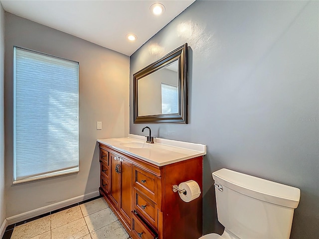 13891 Feather Sound Dr, Clearwater, FL 33762 - half bathroom featuring vanity and recessed lighting