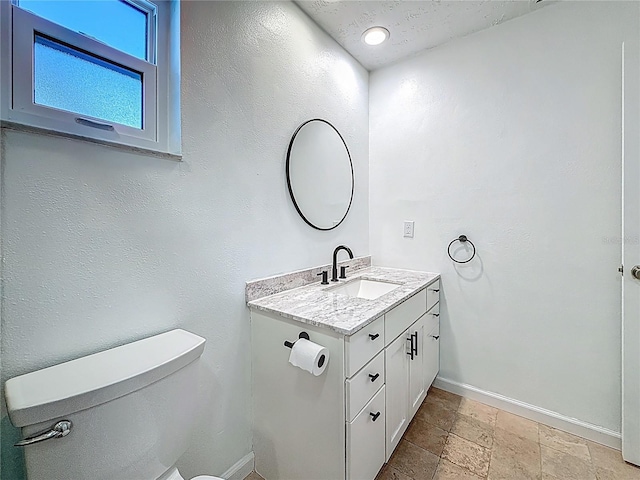 13891 Feather Sound Dr, Clearwater, FL 33762 - bathroom with stone tile floors and vanity