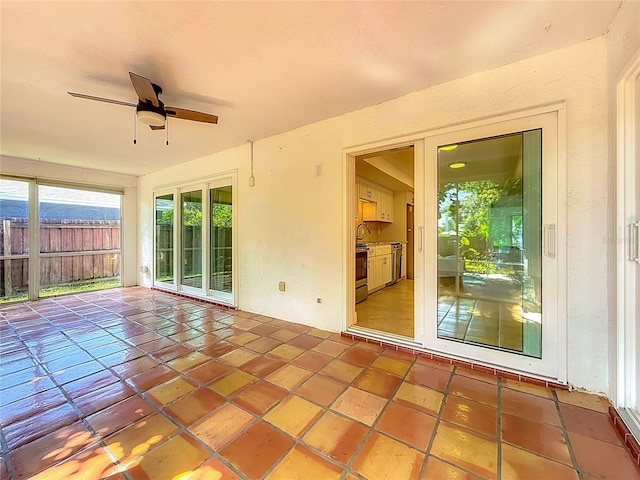 13891 Feather Sound Dr, Clearwater, FL 33762 - unfurnished sunroom featuring a sink