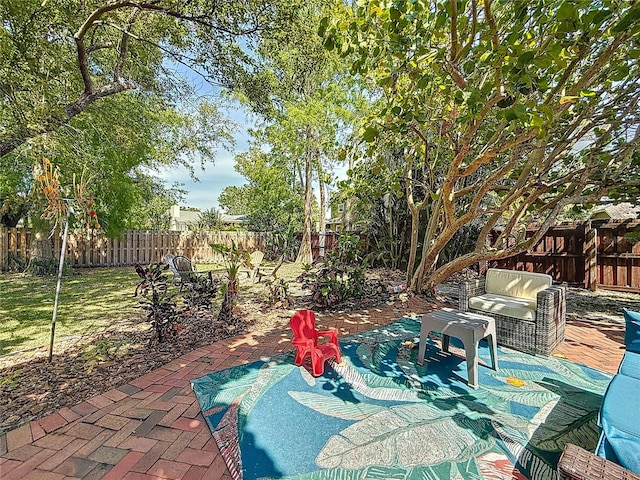 13891 Feather Sound Dr, Clearwater, FL 33762 - fenced backyard featuring a patio