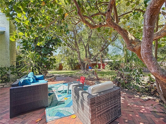 13891 Feather Sound Dr, Clearwater, FL 33762 - fenced backyard featuring outdoor lounge area and a patio area