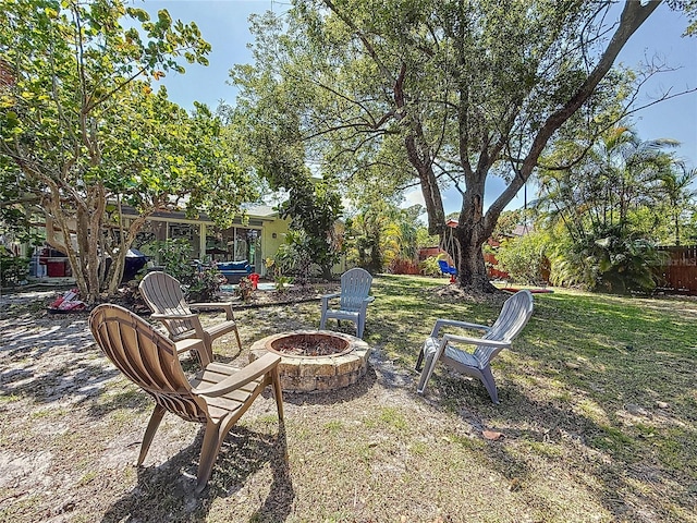 13891 Feather Sound Dr, Clearwater, FL 33762 - view of yard with a fire pit