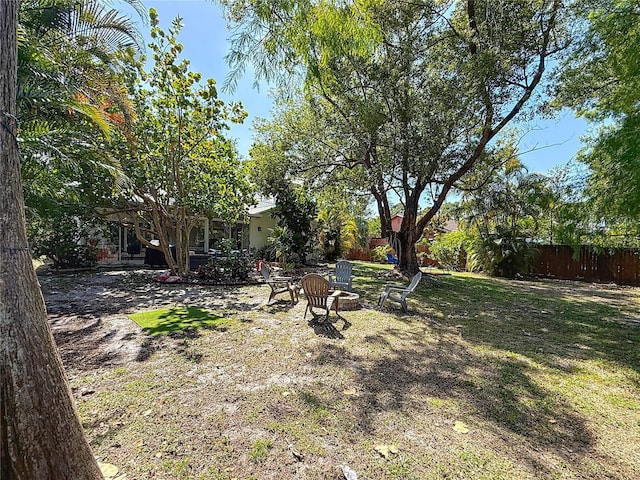 13891 Feather Sound Dr, Clearwater, FL 33762 - view of yard featuring an outdoor fire pit