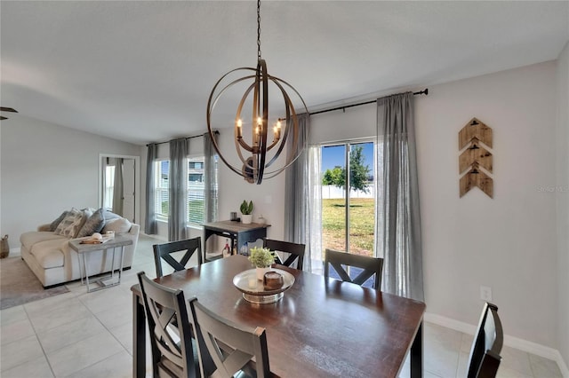 13506 Wild Ginger St, Riverview, FL 33579 - dining area with healthy amount of natural light, a chandelier, and light tile patterned floors