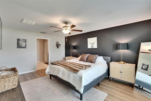 13506 Wild Ginger St, Riverview, FL 33579 - bedroom featuring light wood-type flooring and ceiling fan