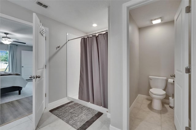 13506 Wild Ginger St, Riverview, FL 33579 - ensuite bathroom featuring a shower stall and a ceiling fan