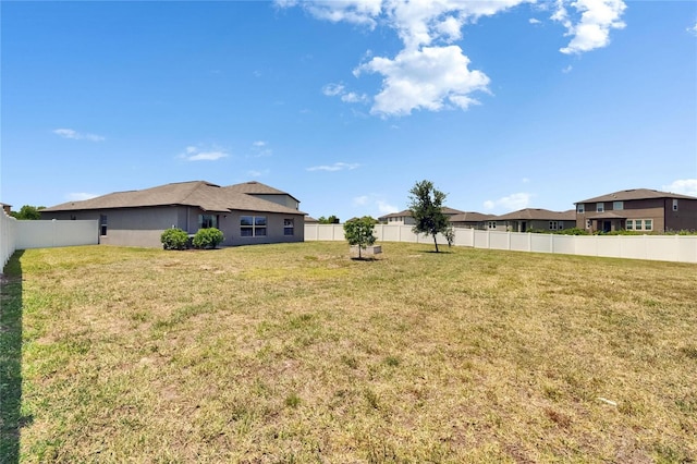 13506 Wild Ginger St, Riverview, FL 33579 - fenced backyard featuring a residential view