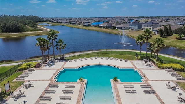 13506 Wild Ginger St, Riverview, FL 33579 - community pool with a water view and a patio area