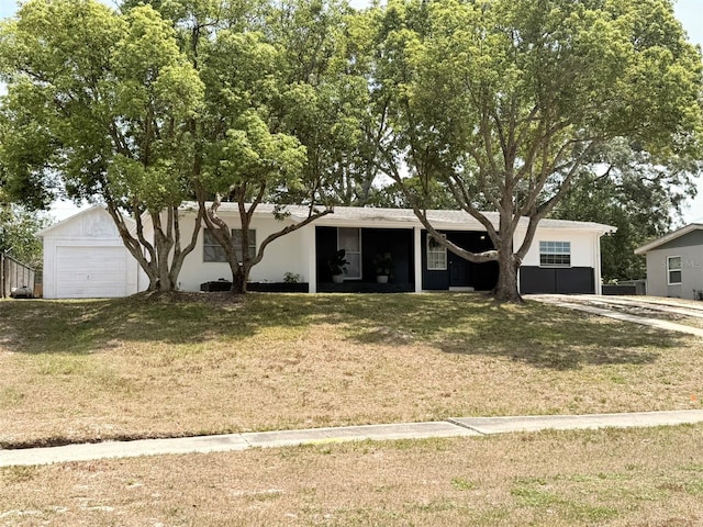 1505 Piedmont Dr, Deltona, FL 32725 - view of front facade with a front yard and a garage