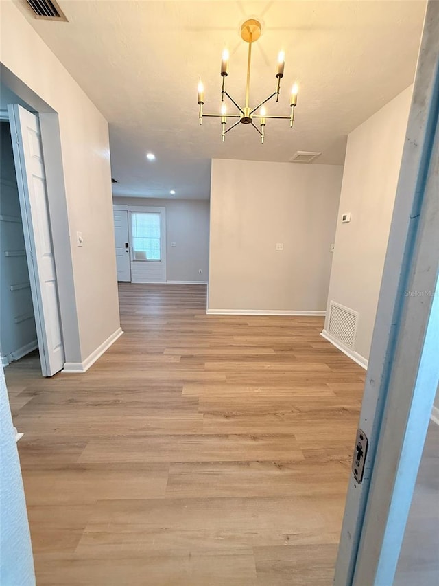 1505 Piedmont Dr, Deltona, FL 32725 - unfurnished dining area featuring a chandelier, light wood-style floors, baseboards, and recessed lighting