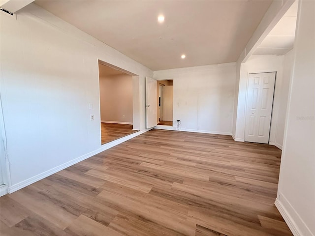 1505 Piedmont Dr, Deltona, FL 32725 - unfurnished room featuring baseboards, light wood finished floors, and recessed lighting