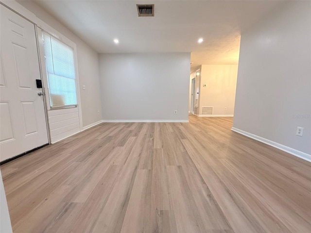 1505 Piedmont Dr, Deltona, FL 32725 - foyer with light wood-style floors, recessed lighting, and baseboards