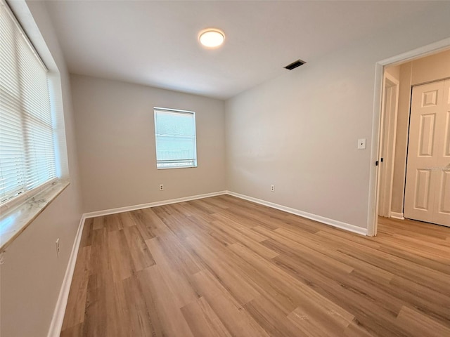 1505 Piedmont Dr, Deltona, FL 32725 - unfurnished room featuring light wood-type flooring and baseboards