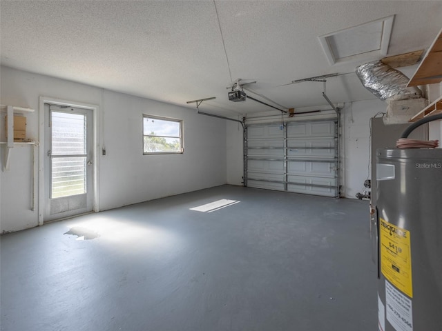 garage with water heater and a garage door opener