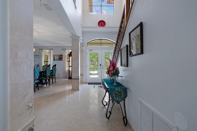 15630 N Himes Ave, Tampa, FL 33618 - foyer with french doors, visible vents, and ornate columns