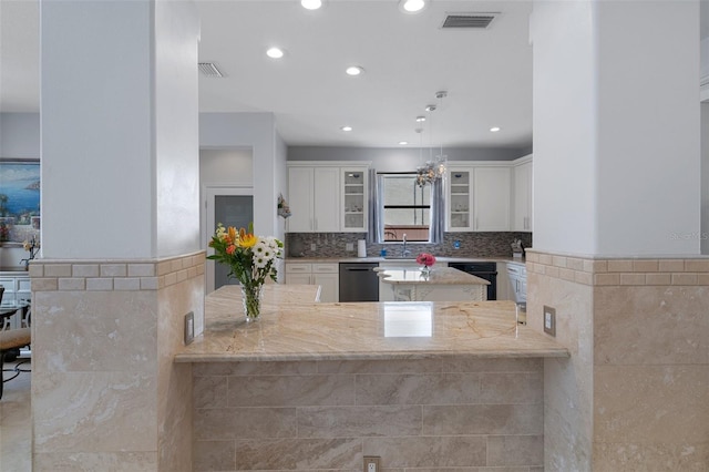 15630 N Himes Ave, Tampa, FL 33618 - kitchen featuring recessed lighting, glass insert cabinets, visible vents, and stainless steel dishwasher