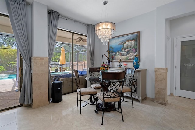 15630 N Himes Ave, Tampa, FL 33618 - dining area with an inviting chandelier, a healthy amount of sunlight, and light tile patterned flooring