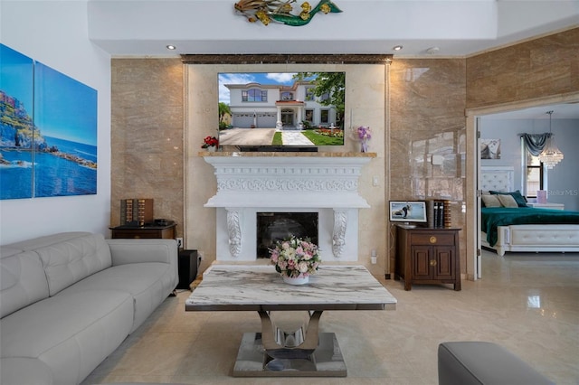 15630 N Himes Ave, Tampa, FL 33618 - living area with a chandelier and a fireplace with raised hearth