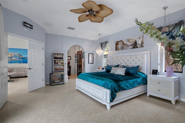 15630 N Himes Ave, Tampa, FL 33618 - bedroom with a ceiling fan, visible vents, arched walkways, and light tile patterned flooring