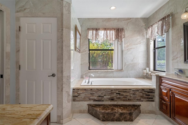 15630 N Himes Ave, Tampa, FL 33618 - full bathroom with a bath, tile walls, vanity, and tile patterned floors