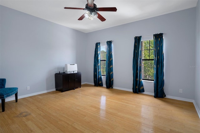 15630 N Himes Ave, Tampa, FL 33618 - empty room with light wood-style flooring, baseboards, and ceiling fan