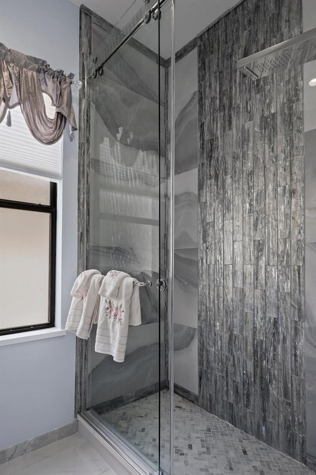 15630 N Himes Ave, Tampa, FL 33618 - bathroom featuring a marble finish shower