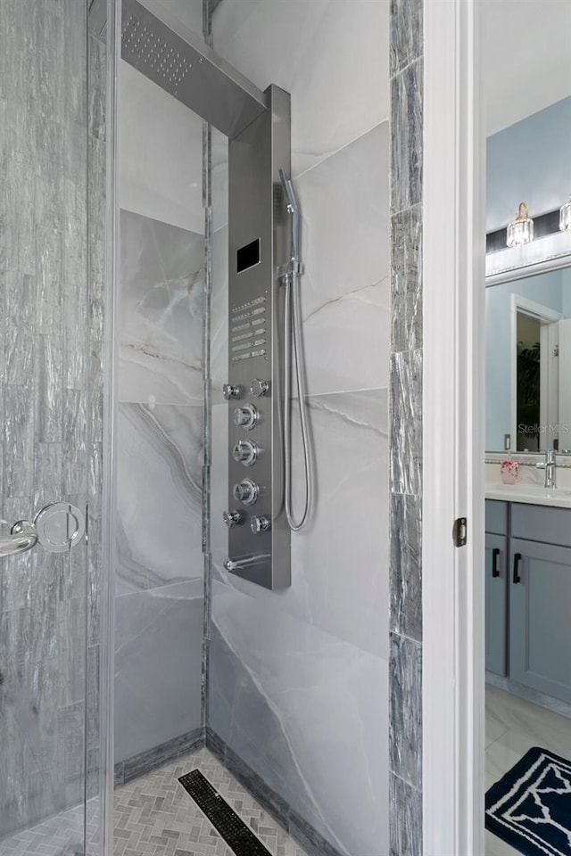 15630 N Himes Ave, Tampa, FL 33618 - full bathroom featuring a marble finish shower and vanity