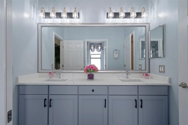15630 N Himes Ave, Tampa, FL 33618 - full bathroom featuring a sink and double vanity