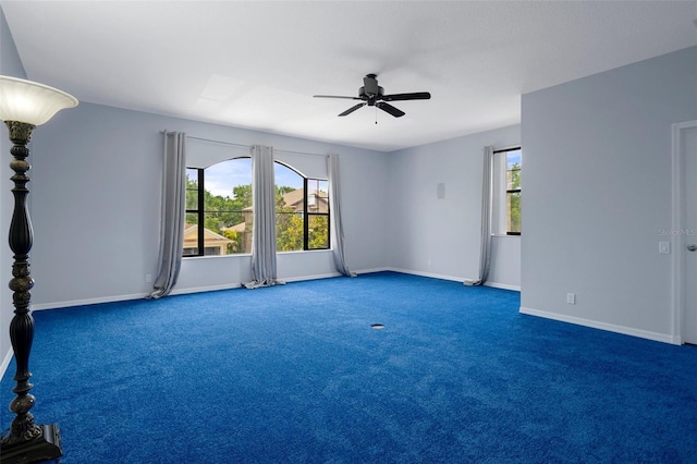 15630 N Himes Ave, Tampa, FL 33618 - unfurnished room with carpet floors, a ceiling fan, and baseboards