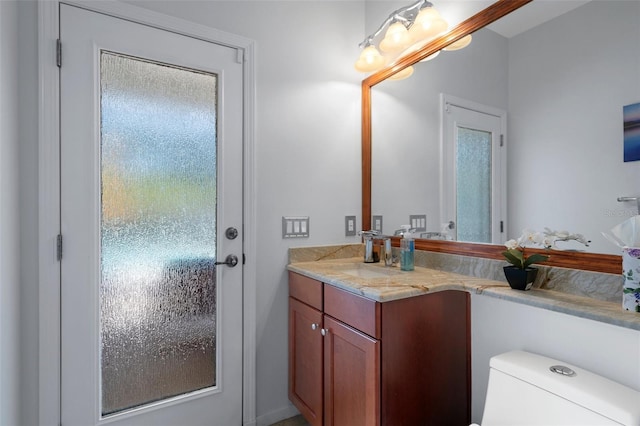 15630 N Himes Ave, Tampa, FL 33618 - bathroom featuring toilet and vanity