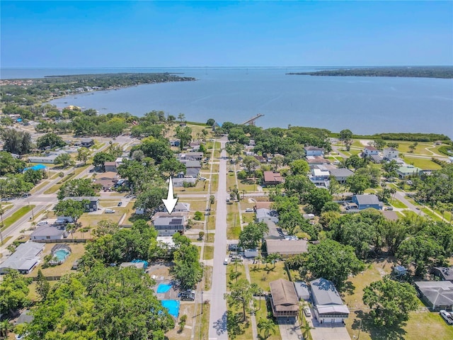 bird's eye view with a residential view and a water view