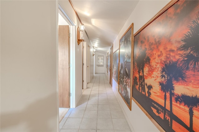 corridor with light tile patterned flooring