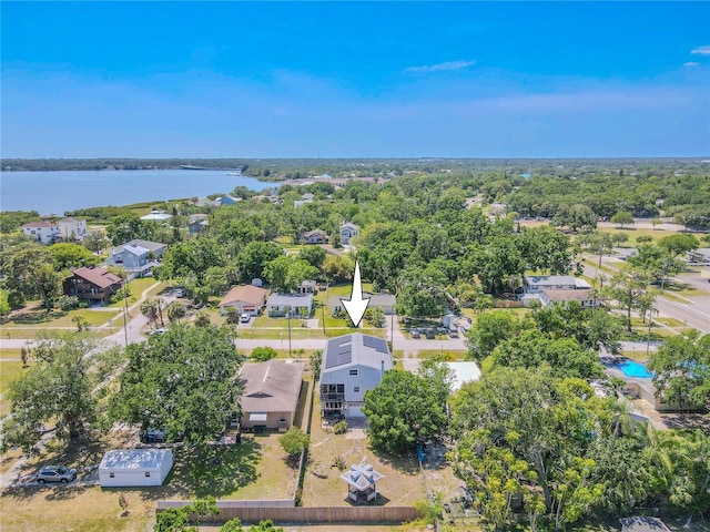 aerial view with a residential view and a water view