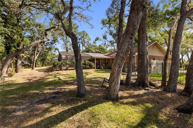 view of yard with fence