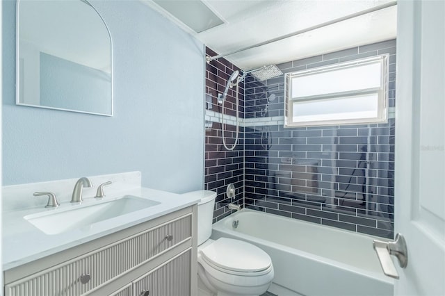 full bath featuring toilet, vanity, and  shower combination