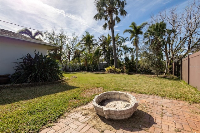 view of yard featuring a patio area and a fenced backyard