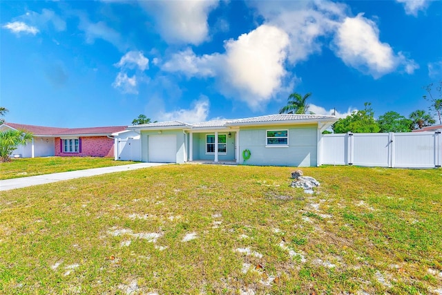 1859 Northview Rd, Largo, FL 33770 - ranch-style house featuring a front yard, a gate, driveway, an attached garage, and fence