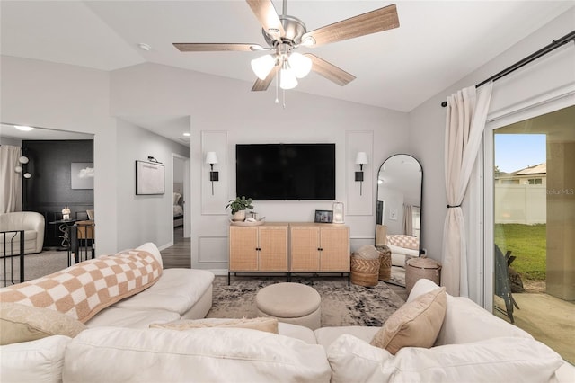 6873 SW 131st Pl, Ocala, FL 34473 - carpeted living room with ceiling fan and vaulted ceiling