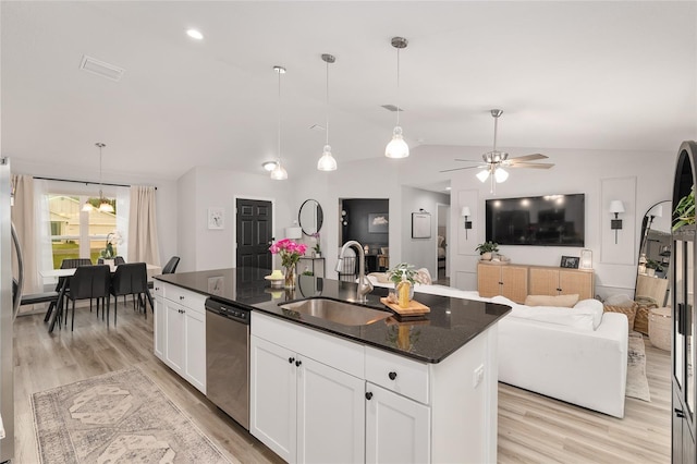 6873 SW 131st Pl, Ocala, FL 34473 - kitchen with visible vents, a sink, lofted ceiling, light wood-style floors, and stainless steel appliances