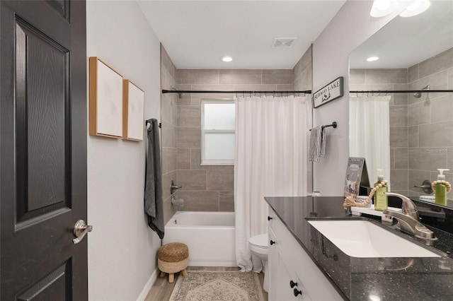 6873 SW 131st Pl, Ocala, FL 34473 - full bath featuring visible vents, vanity, toilet, recessed lighting, and shower / bath combo