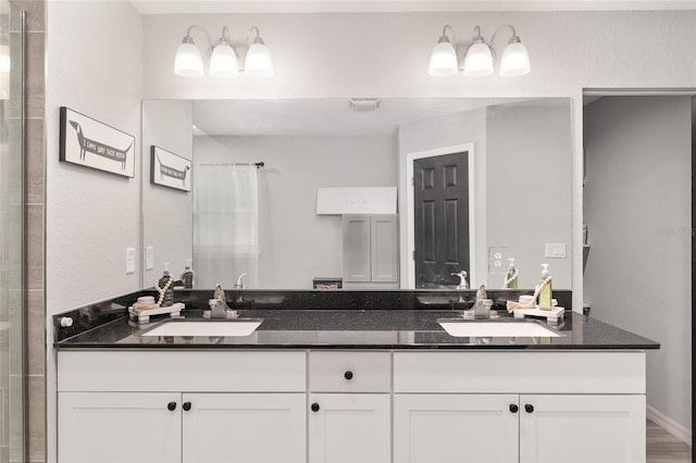 6873 SW 131st Pl, Ocala, FL 34473 - full bathroom with a sink, double vanity, and a shower with shower curtain