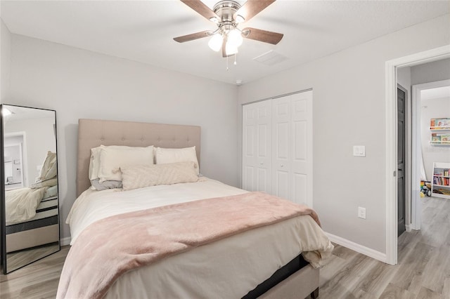 6873 SW 131st Pl, Ocala, FL 34473 - bedroom featuring light wood-style floors, baseboards, and a closet