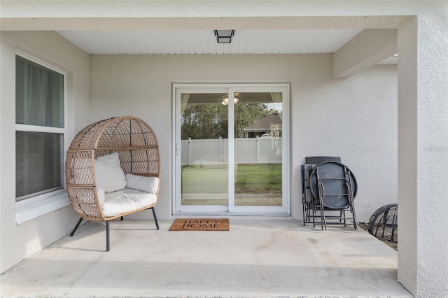 6873 SW 131st Pl, Ocala, FL 34473 - view of exterior entry with a patio area and stucco siding