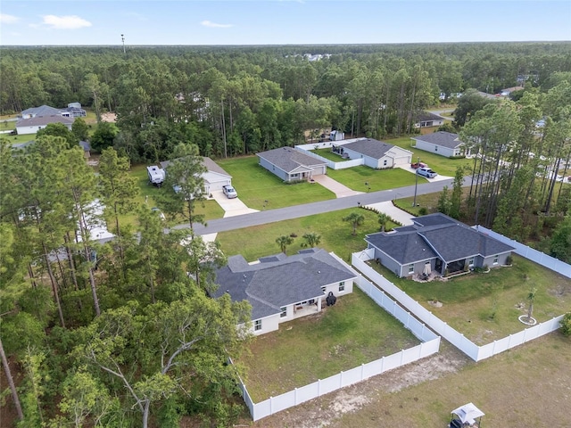 6873 SW 131st Pl, Ocala, FL 34473 - drone / aerial view featuring a residential view and a wooded view