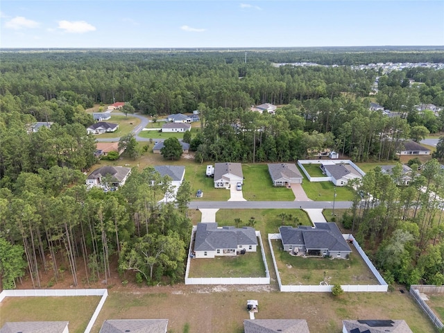 6873 SW 131st Pl, Ocala, FL 34473 - drone / aerial view with a residential view and a wooded view