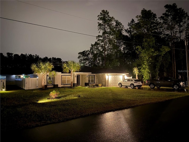 6873 SW 131st Pl, Ocala, FL 34473 - view of yard with an attached garage and driveway