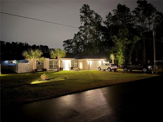 6873 SW 131st Pl, Ocala, FL 34473 - exterior space featuring an attached garage, driveway, and a front yard