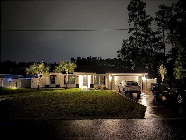 6873 SW 131st Pl, Ocala, FL 34473 - view of front of property with a lawn, an attached garage, and driveway