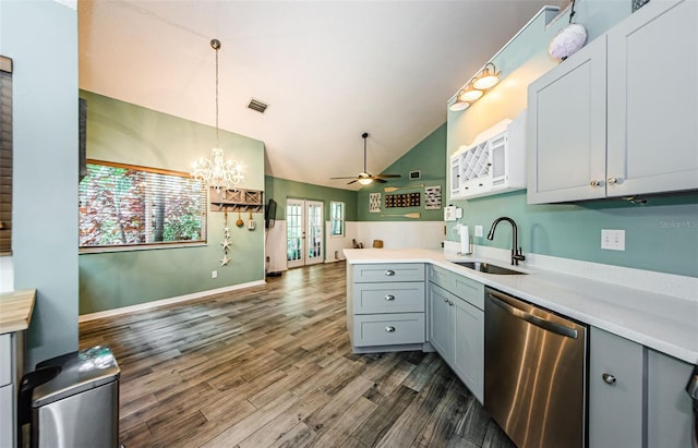 678 Greenglen Ln, Palm Harbor, FL 34684 - kitchen with stainless steel dishwasher, a sink, gray cabinetry, a ceiling fan, and light countertops
