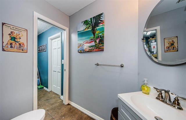 678 Greenglen Ln, Palm Harbor, FL 34684 - half bath featuring vanity, tile patterned floors, toilet, and baseboards